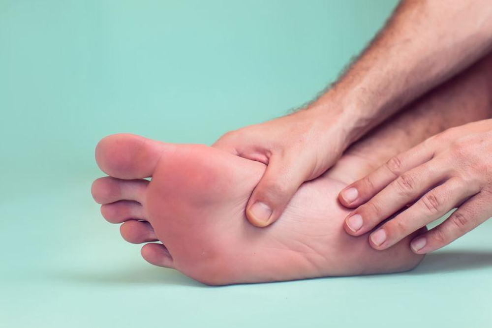 foot with green background