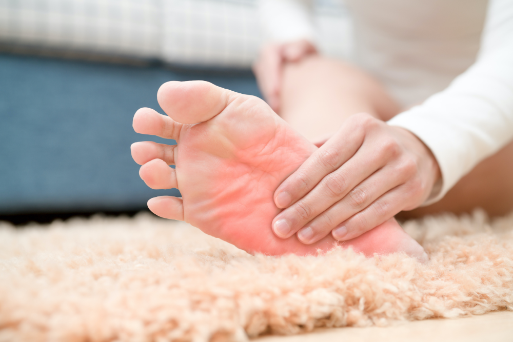 While massaging a woman's foot, she experienced agony from arthritis.