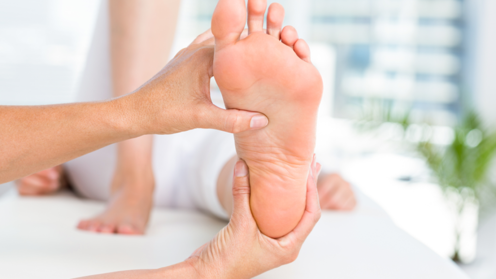 nurse holding a foot