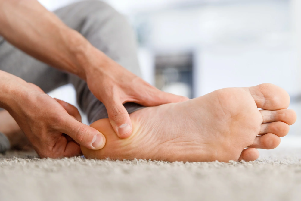 man hands giving foot massage